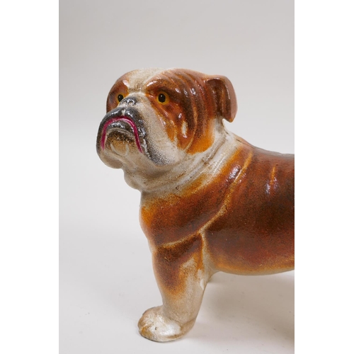 213 - A painted cast iron bull dog, 22cm long