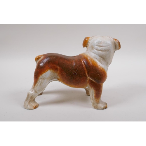 213 - A painted cast iron bull dog, 22cm long