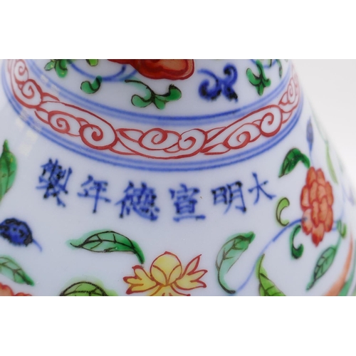 215 - A Wucai porcelain pear shaped vase with phoenix and scrolling floral decoration, Chinese Xuande 6 ch... 