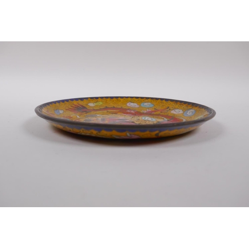 216 - A Chinese yellow ground cloisonne dish decorated with a dragon chasing the flaming pearl, 20cm diame... 