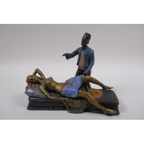 217 - A cold painted bronze figure of a sleeping nude, 19cm long