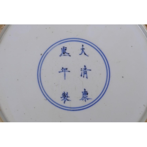 225 - A famille vert porcelain charger with rolled rim, decorated with warriors on horseback, Chinese Kang... 