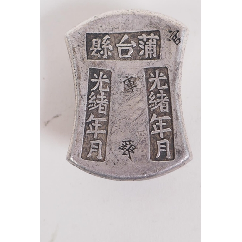 226 - A pair of Chinese white metal tokens/ingots and another similar with impressed character marks, larg... 