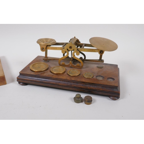 227 - A set of antique brass postage scales by S. Mordan & Co, and an accompanying box of brass weight... 