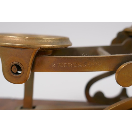 227 - A set of antique brass postage scales by S. Mordan & Co, and an accompanying box of brass weight... 