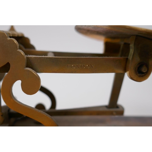 227 - A set of antique brass postage scales by S. Mordan & Co, and an accompanying box of brass weight... 