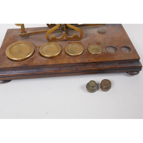 227 - A set of antique brass postage scales by S. Mordan & Co, and an accompanying box of brass weight... 