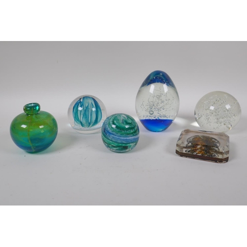 237 - Five glass paperweights including a Caithness 'Blue Octavia', and a swirled art glass scent bottle, ... 