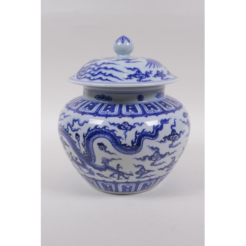 241 - A blue and white porcelain ginger jar and cover with dragon and phoenix decoration, Chinese Xuande 6... 