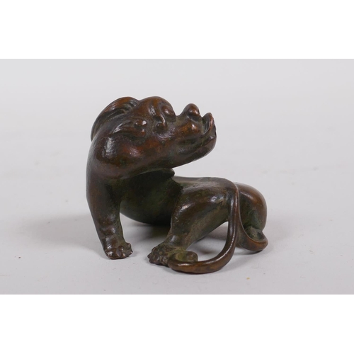 245 - A Japanese style bronze okimono kylin, 5cm long