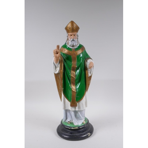 252 - A painted plaster figure of a bearded priest, 46cm high, AF