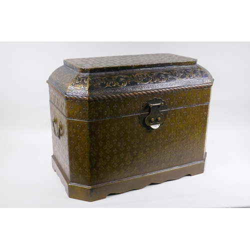 259 - An Indo-Chinese lacquered casket with embossed fleur de lys decoration, 51 x 30cm, 38cm high