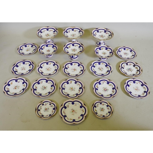 269 - A Minton dessert service, comprising three tazza, 25cm diameter, 15cm high, one 12cm high, AF, base ... 