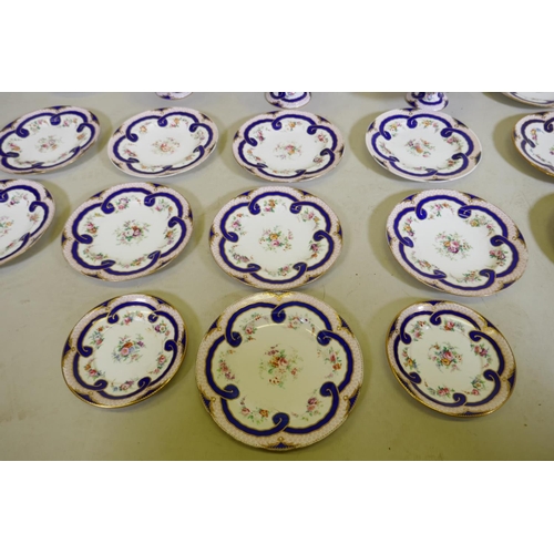 269 - A Minton dessert service, comprising three tazza, 25cm diameter, 15cm high, one 12cm high, AF, base ... 