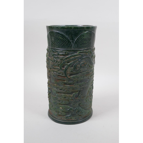 271 - A Chinese reconstituted green hardstone brush pot with dragon and flaming pearl decoration, mark to ... 