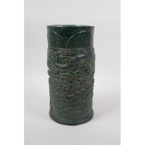 271 - A Chinese reconstituted green hardstone brush pot with dragon and flaming pearl decoration, mark to ... 