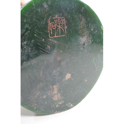 271 - A Chinese reconstituted green hardstone brush pot with dragon and flaming pearl decoration, mark to ... 