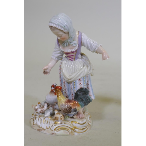 274 - A Royal Copenhagen porcelain figure of a goose girl, marked 12086, a continental porcelain pin cushi... 