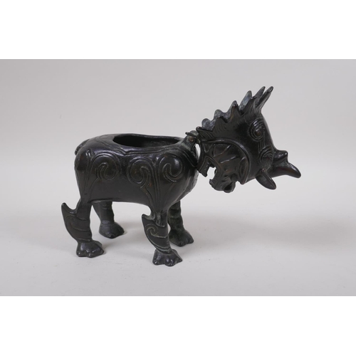 277 - A Chinese bronze censer and cover in the form of a kylin, impressed mark to base, 20cm high