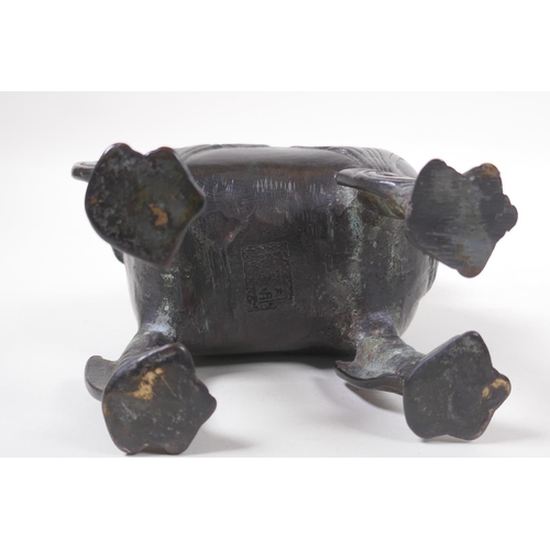 277 - A Chinese bronze censer and cover in the form of a kylin, impressed mark to base, 20cm high