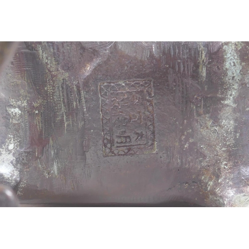 277 - A Chinese bronze censer and cover in the form of a kylin, impressed mark to base, 20cm high