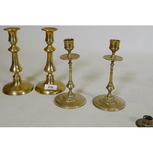 278 - A pair of C18th/C19th  brass candlesticks, possible French/Flemish, with engraved decoration, sconce... 