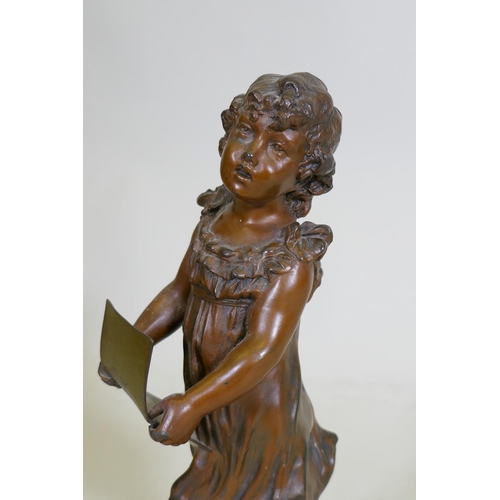 280 - A C19th bronzed spelter figure of a young girl singing from a song sheet, mounted on a marble base, ... 