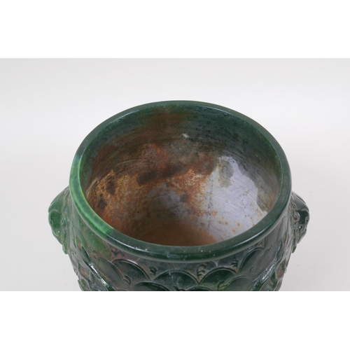 284 - A Chinese reconstituted green hardstone jar with two lion mask handles and raised dragon decoration