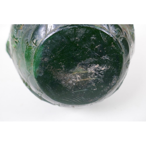 284 - A Chinese reconstituted green hardstone jar with two lion mask handles and raised dragon decoration