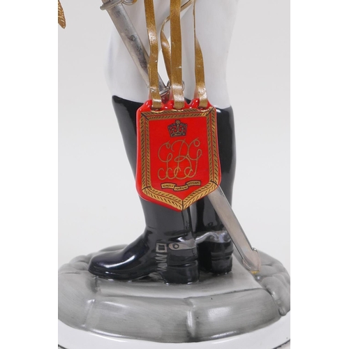 291 - Michael Sutty, porcelain military figure, No 23 Governors Bodyguard Madras initialled NS or SN, 29cm... 