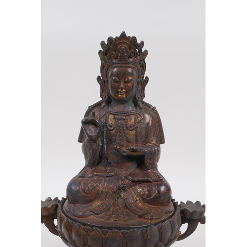 33 - A Sino Tibetan gilt bronze Buddha, seated on lotus flower, 25cm high