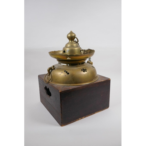 37 - An antique Japanese brass censer housed within an oak box, with an associated cover, 26 x 26cm, 35cm... 