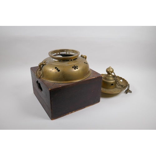 37 - An antique Japanese brass censer housed within an oak box, with an associated cover, 26 x 26cm, 35cm... 