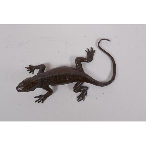 49 - A Japanese bronze okimono lizard, mark to base, 13cm long