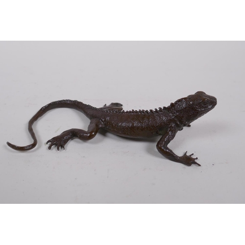 49 - A Japanese bronze okimono lizard, mark to base, 13cm long