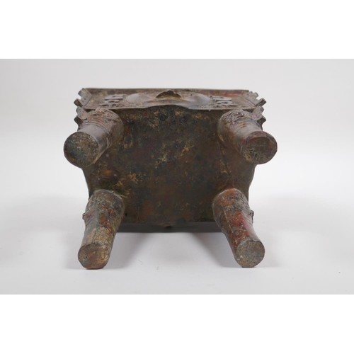 50 - A Chinese archaic style bronze censer with five handles and moonface decoration, 17 x 12cm, 20cm hig... 