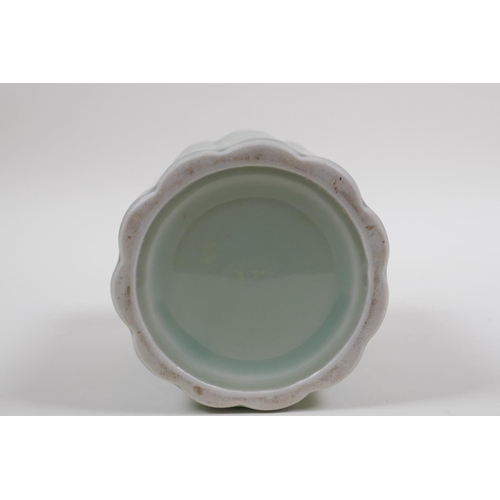 58 - A Chinese celadon glazed porcelain brush pot moulded as bamboo, 12cm high x 10cm diameter 