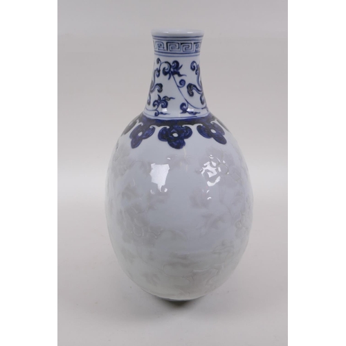 60 - A blue and white porcelain moon flask with raised phoenix decoration, Chinese Xuande 6 character mar... 