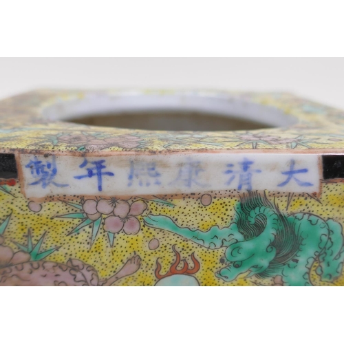 61 - A yellow ground porcelain brush pot of square form with polychrome dragon decoration, Chinese KangXi... 