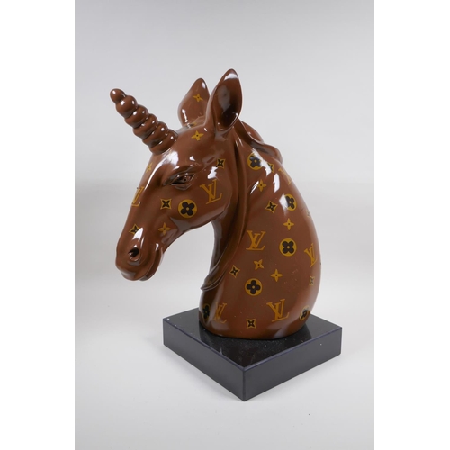 62 - A composition bust of a unicorn with LV style decoration, 45cm high