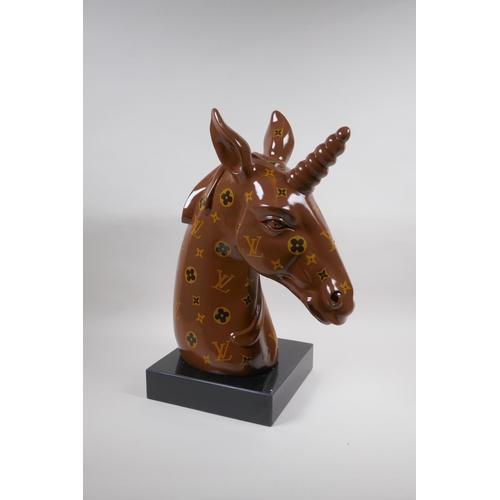 62 - A composition bust of a unicorn with LV style decoration, 45cm high