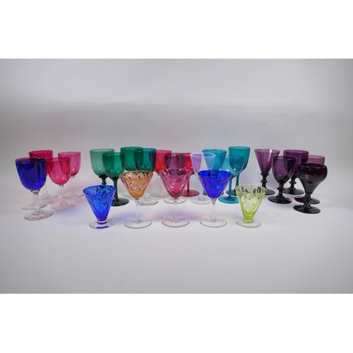 64 - Five 1940s Thomas Webb coloured cocktail glasses and a quantity of other early C20th coloured cockta... 