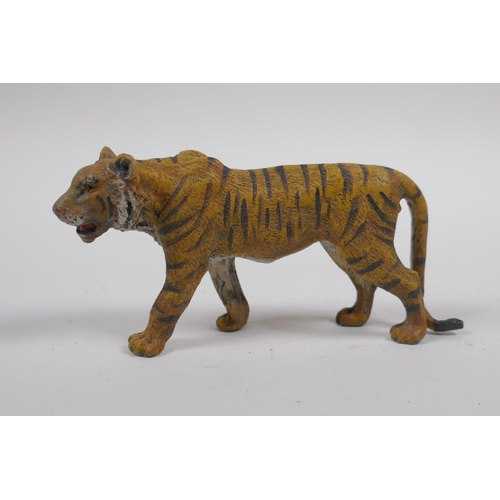 67 - A cold painted bronze figure of a tiger, after Bergman, 11cm long