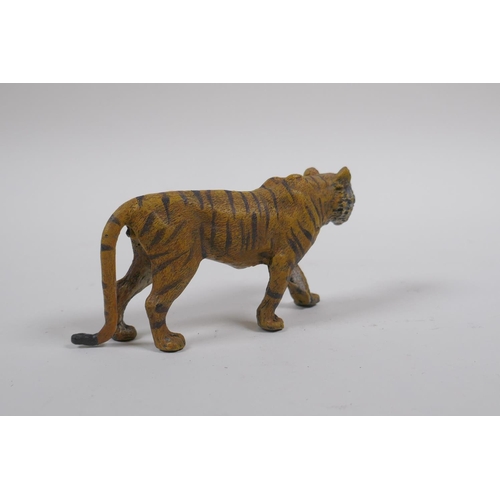 67 - A cold painted bronze figure of a tiger, after Bergman, 11cm long