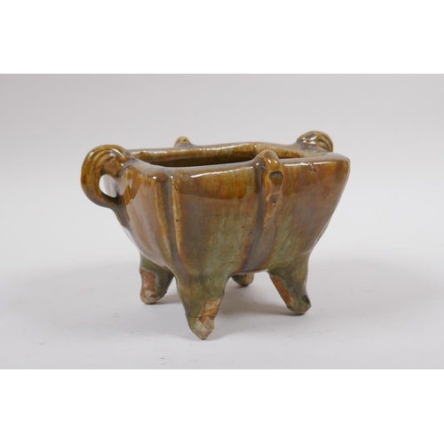 75 - A Chinese slip glazed pottery censer with two handles, impressed ring mark to base, 17 x 14cm, 11cm ... 