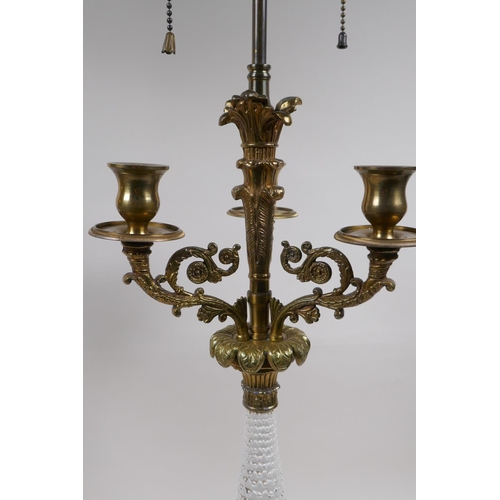 90 - A pair of painted and gilt white metal three branch table lamps converted to electricity, 84cm high