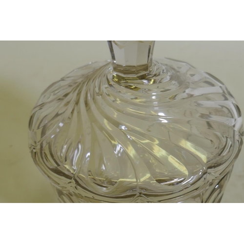 91 - A C19th glass sweetmeat/preserve jar and cover, raised on a pedestal base of good colour, 26cm high