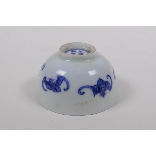 93 - A blue and white porcelain tea bowl with bat decoration, Chinese KangXi 6 character mark to base, 8c... 