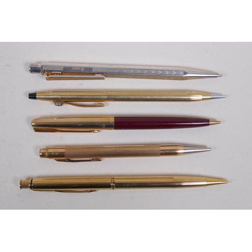 95 - A collection of assorted propelling pencils including a hallmarked silver Bakers Pointer propelling ... 