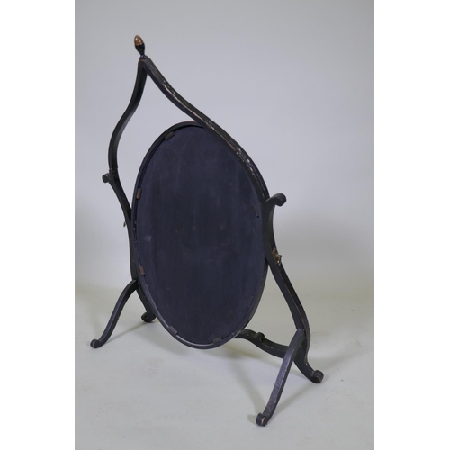 1005 - A 1920s black lacquer skeleton swing toilet mirror, with raised gilt chinoiserie decoration, AF, 50 ... 